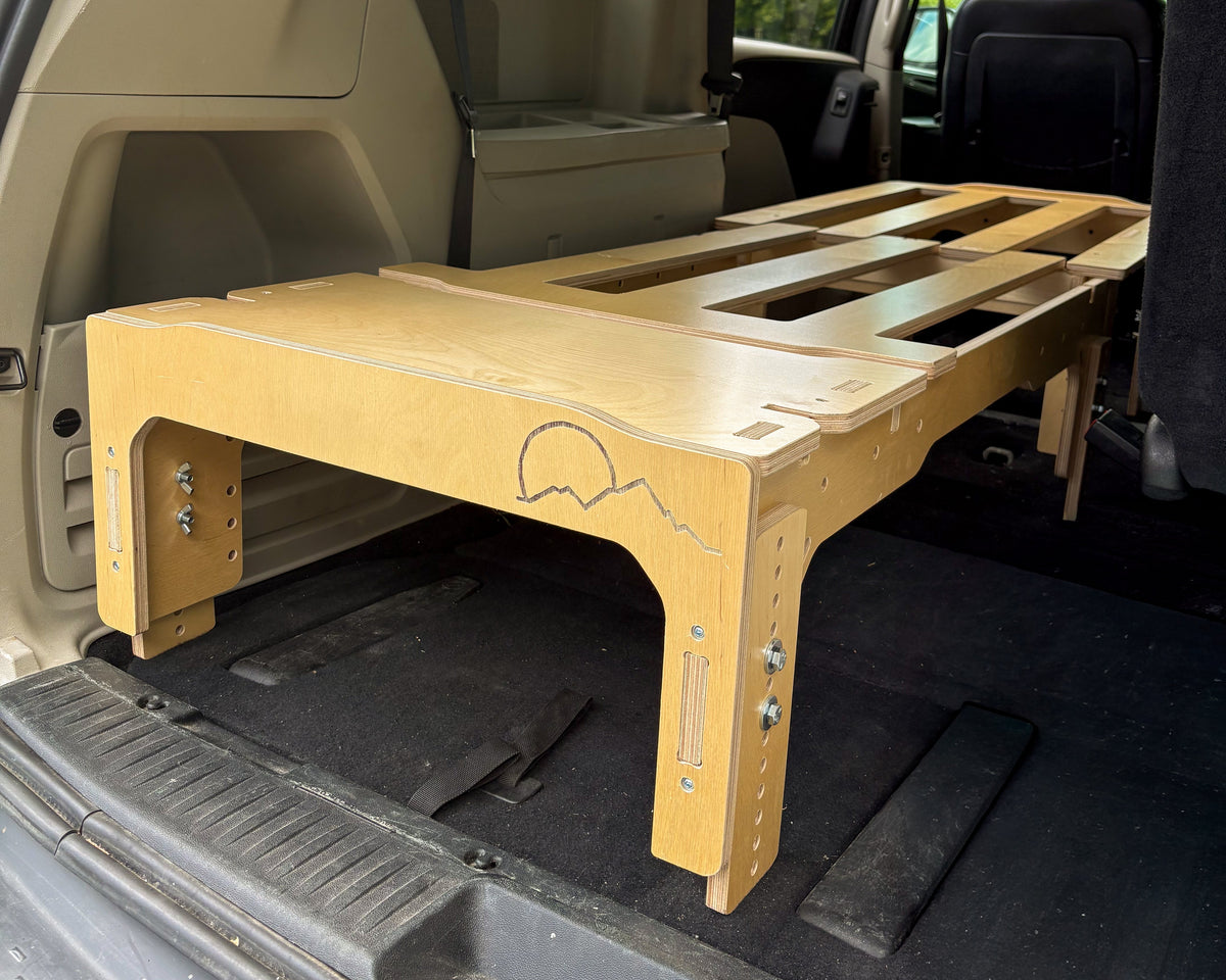 Single Simple Kit bed platform opened flat inside a van